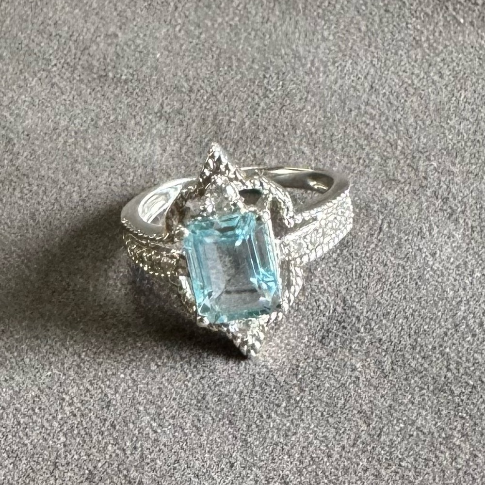 Lovely ring! Blue Topaz emerald cut in Sterling silver.
